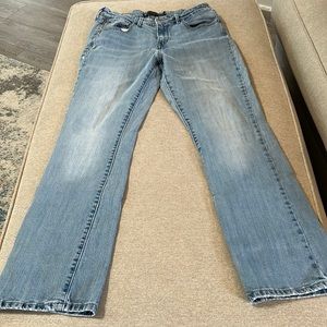 Levi’s, light wash boot cut jeans